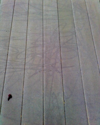 An improperly power washed deck.