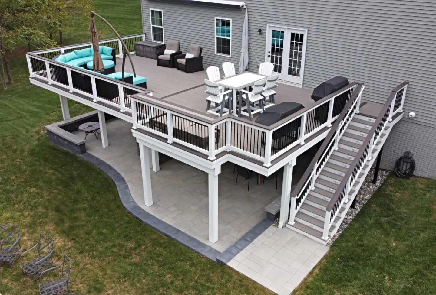 3d design of elevated residential deck with lighting and a outdoor living furniture