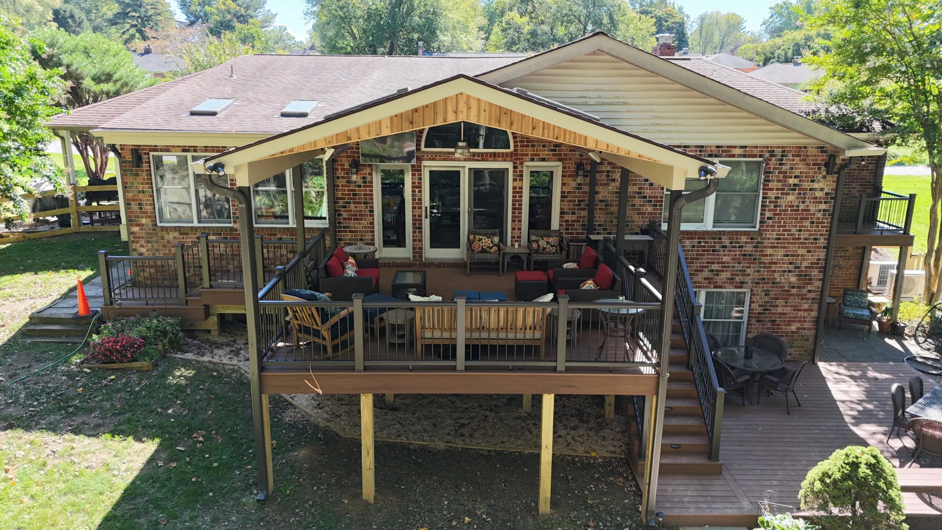 Aerial view of the elevated deck with porch and furniture