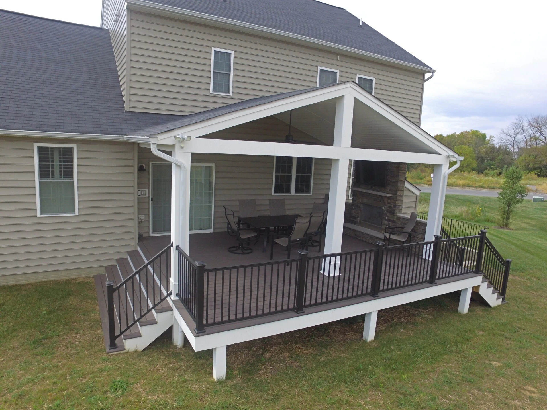 Aerial view of the residential deck with porch enclosure