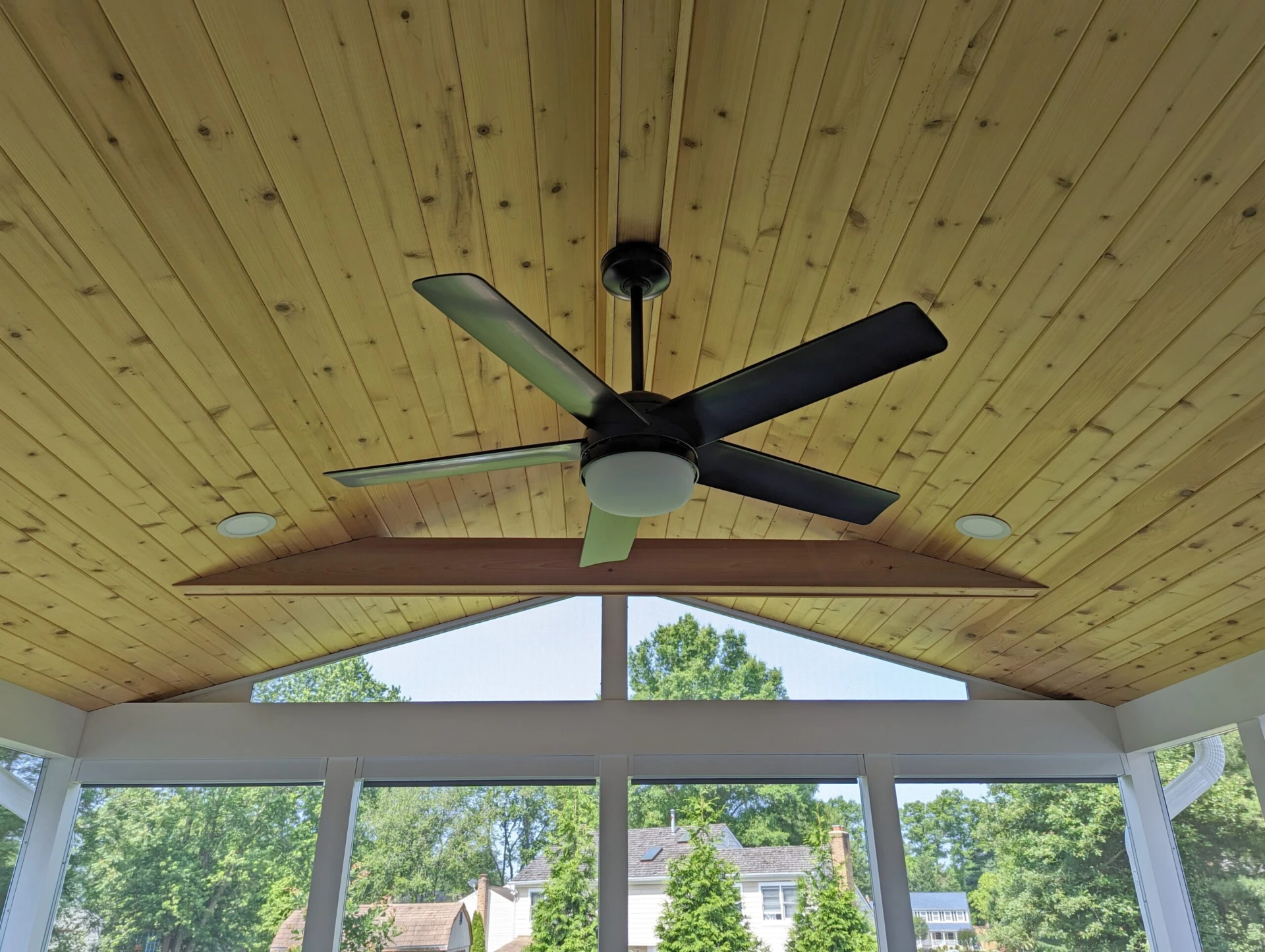 Cedar porch ceiling with fan and recessed lighting