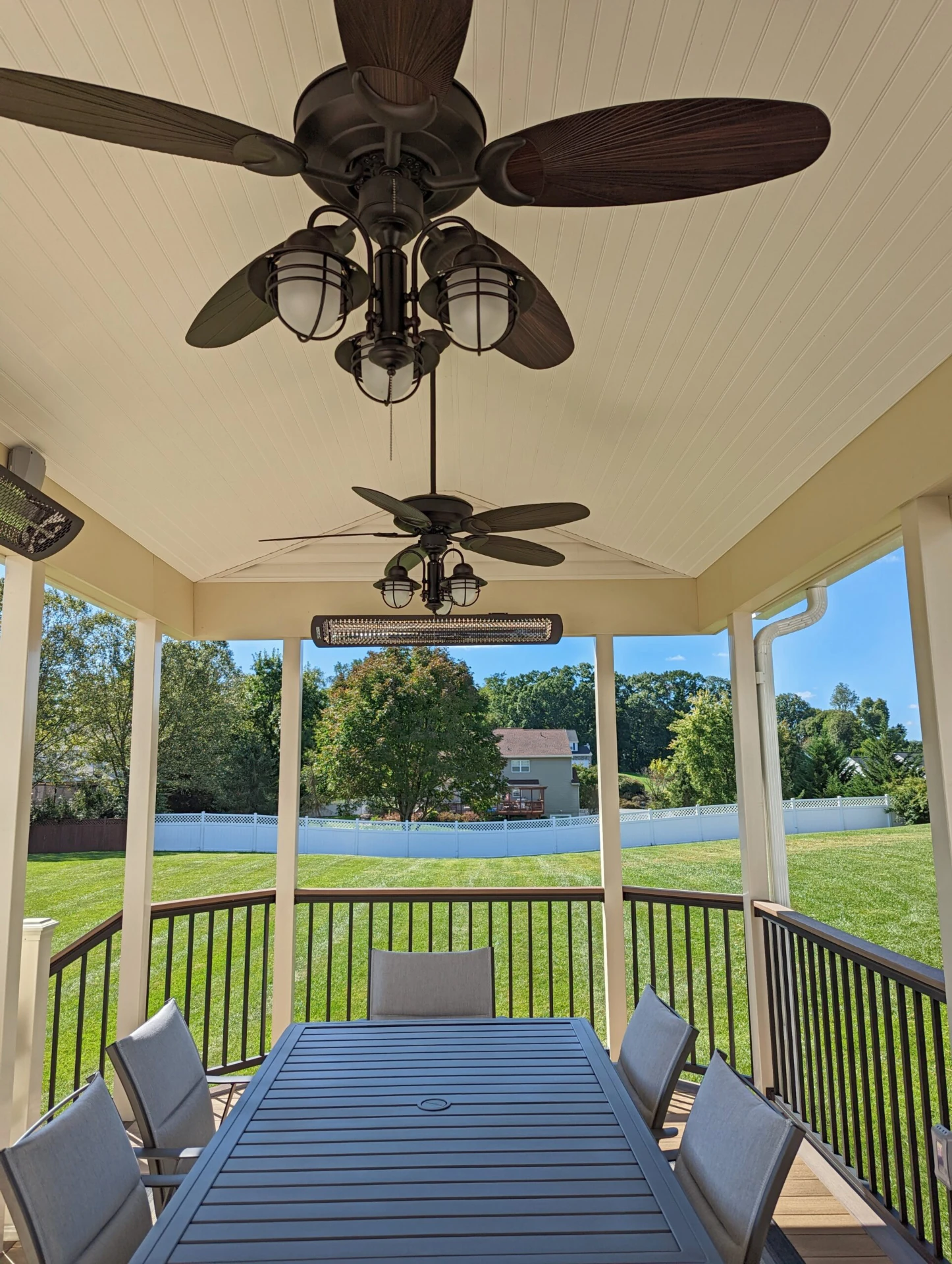Custom porch with heater and overlooking lawn view