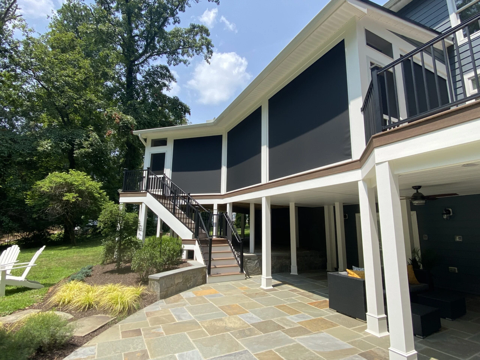 Elevated deck with closed screen porch