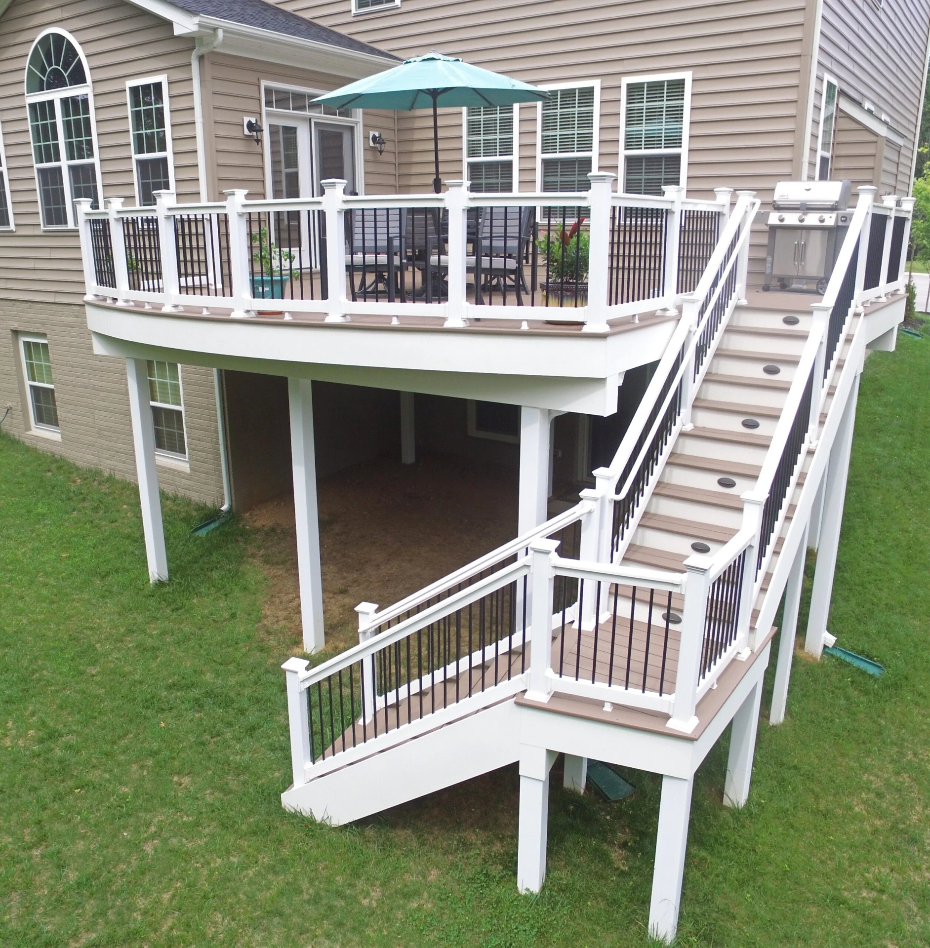 Elevated residential deck with outdoor living furniture