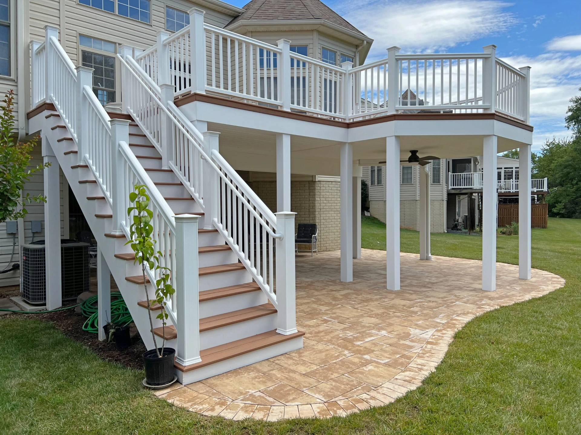 Furniture under deck system with white railing