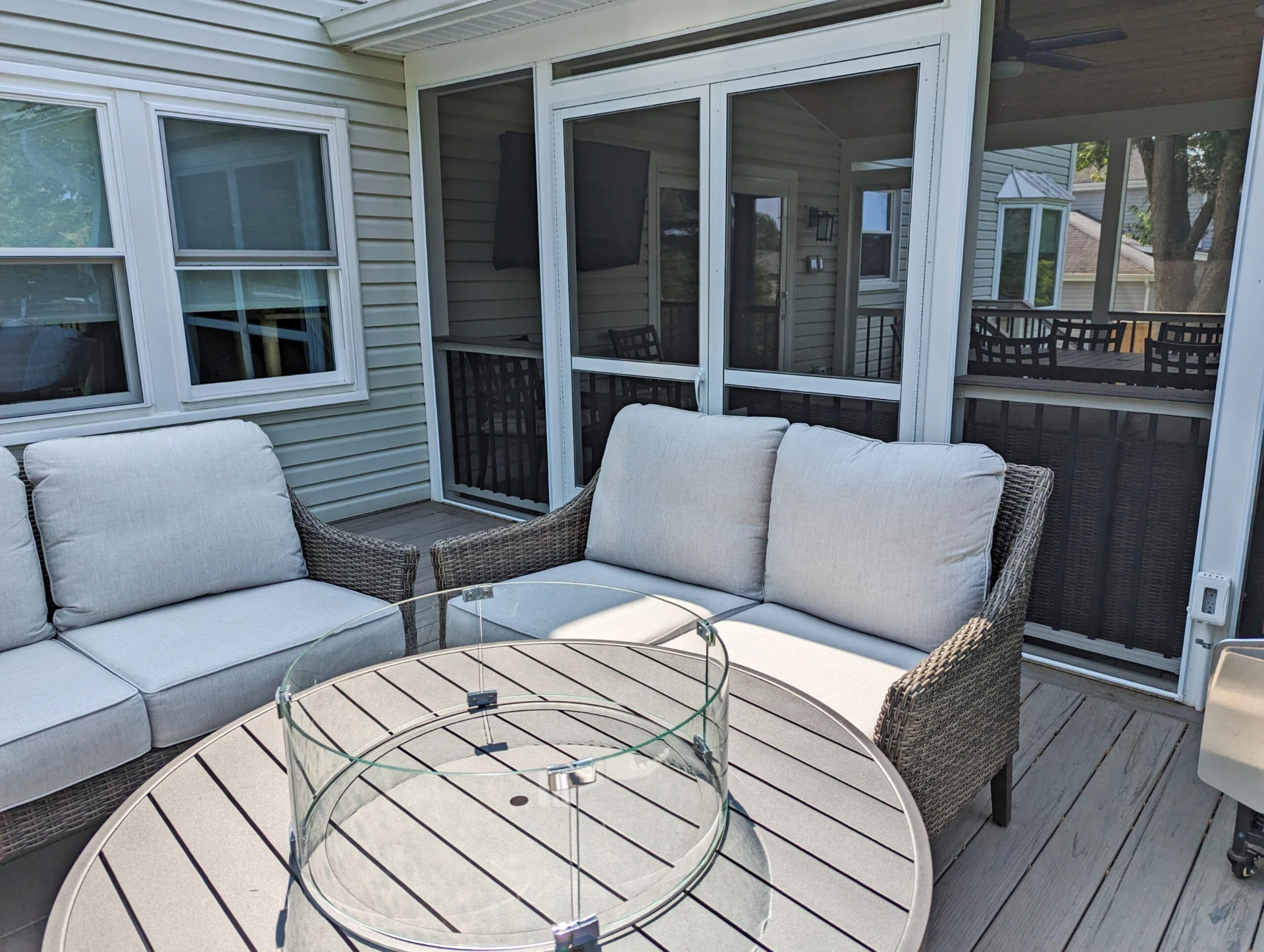 Outdoor living furniture with ashwood deck and screened porch