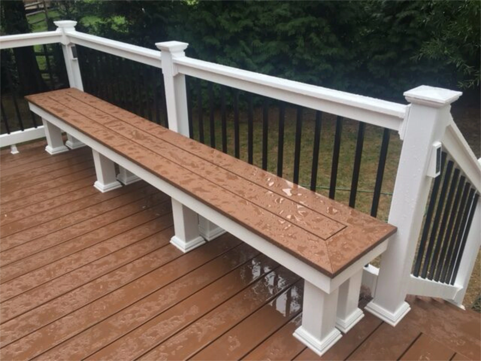 Raised wet deck with a chair and a white rail