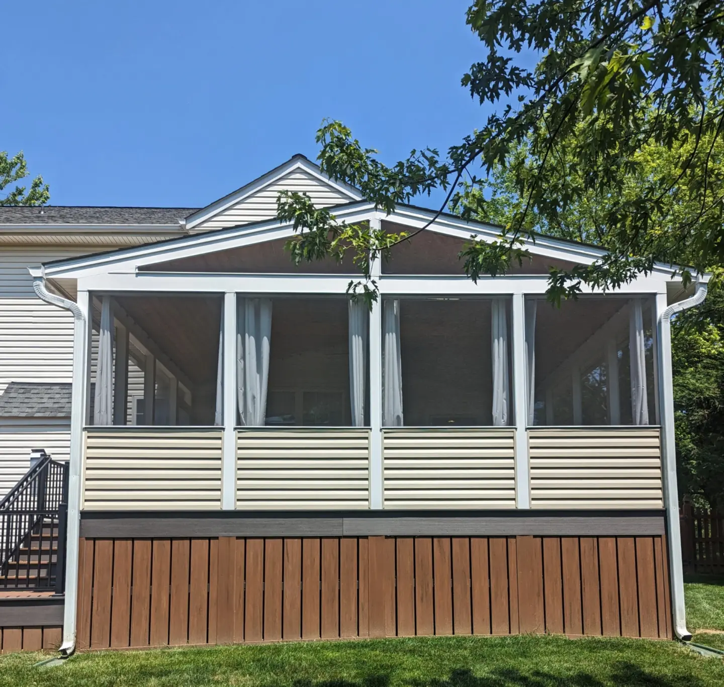 Screened porch with skirting and nature view