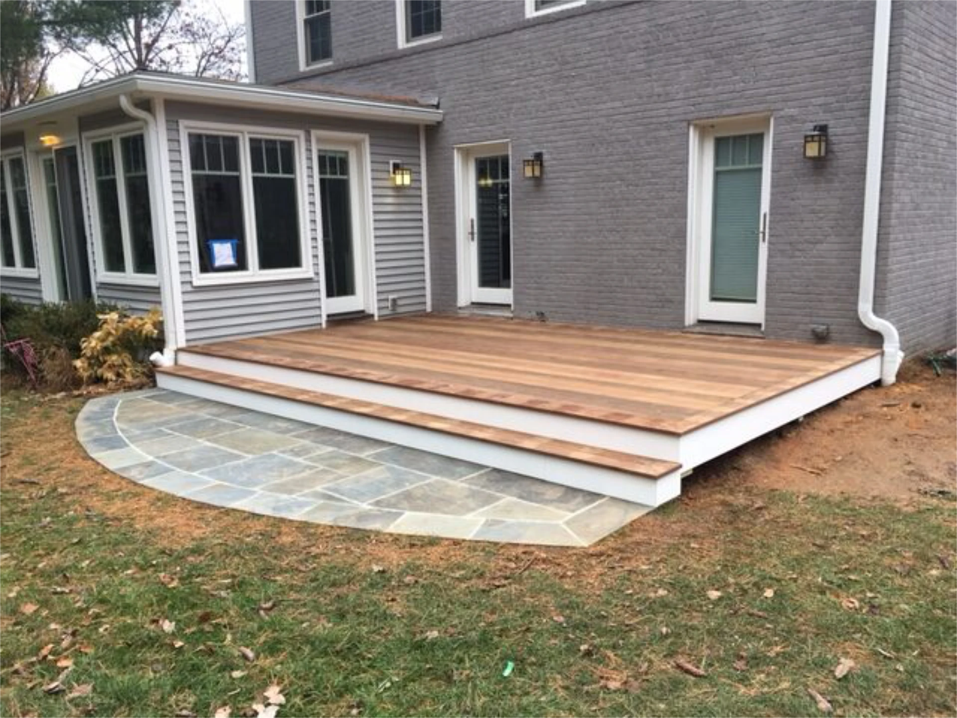 Wooden deck design and installation on the big house